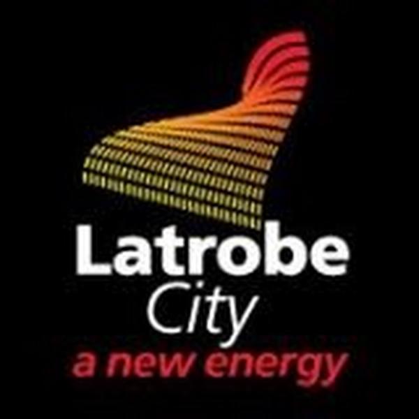 Latrobe city council logo, showing a large curve representing a road comprosed of small rectangles ranging in colour from pale yellow to orange and a deep red